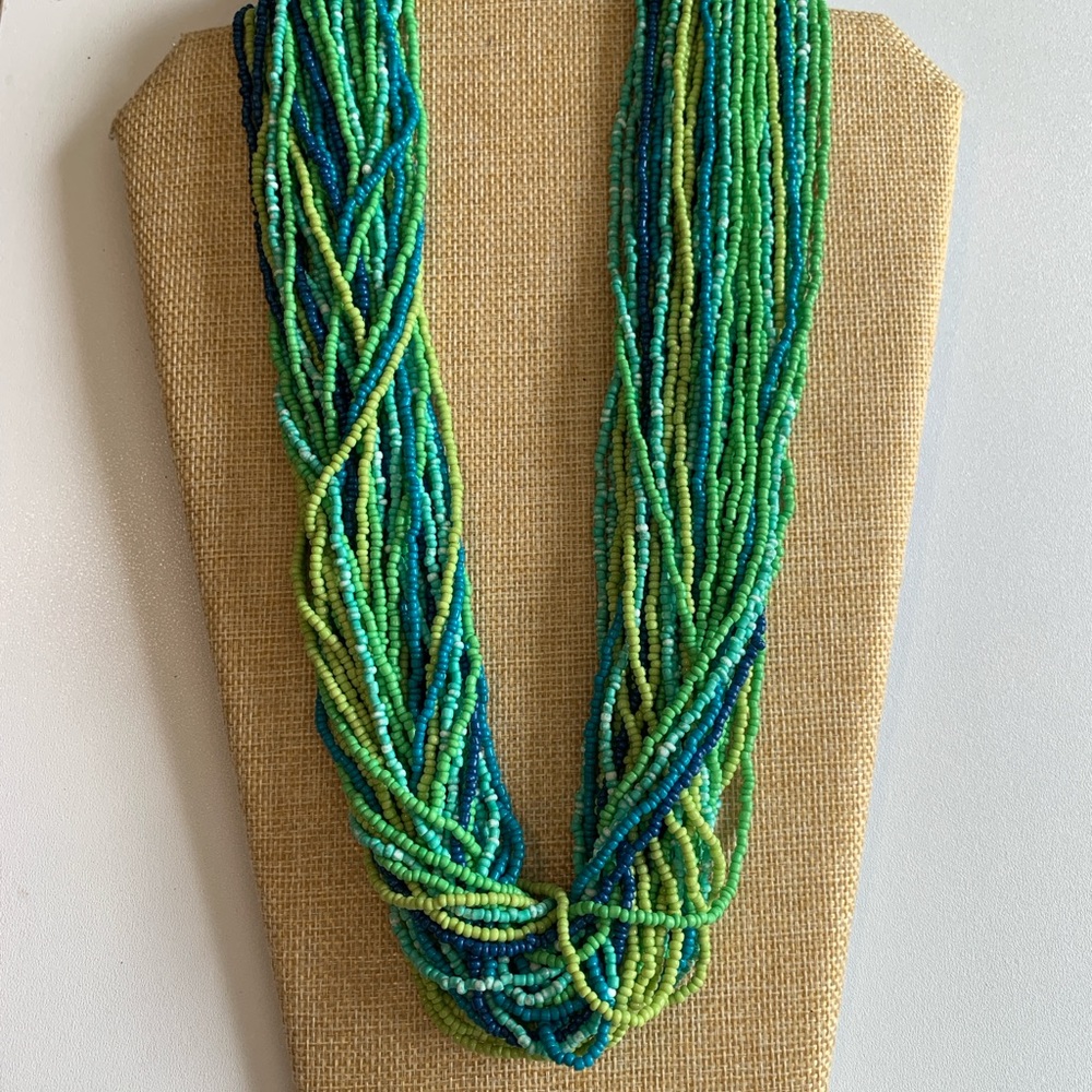 Striking seed bead necklace in ocean tones.